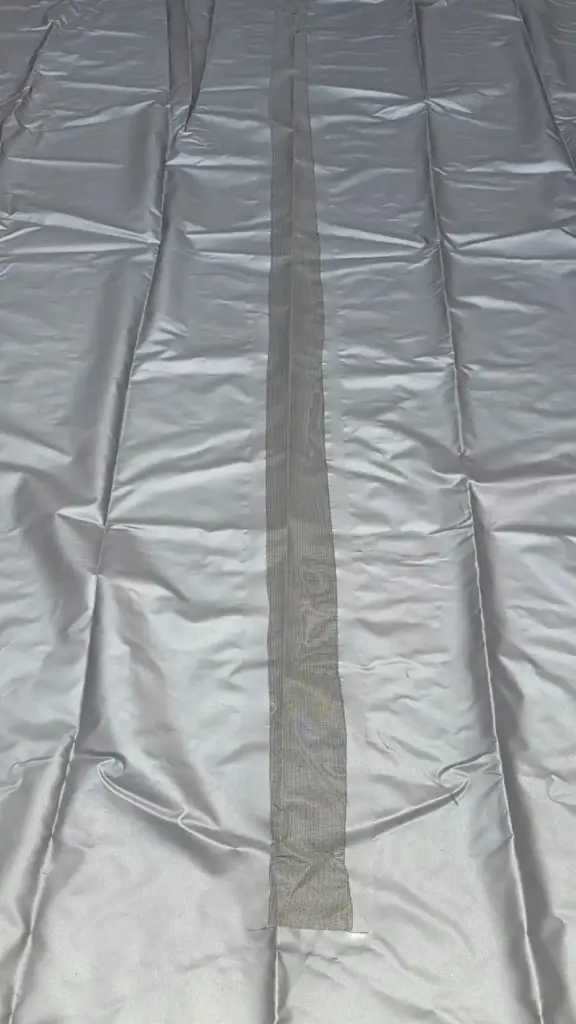 Regengoot in afdekzeil